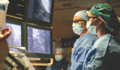 doctors reviewing x-ray results