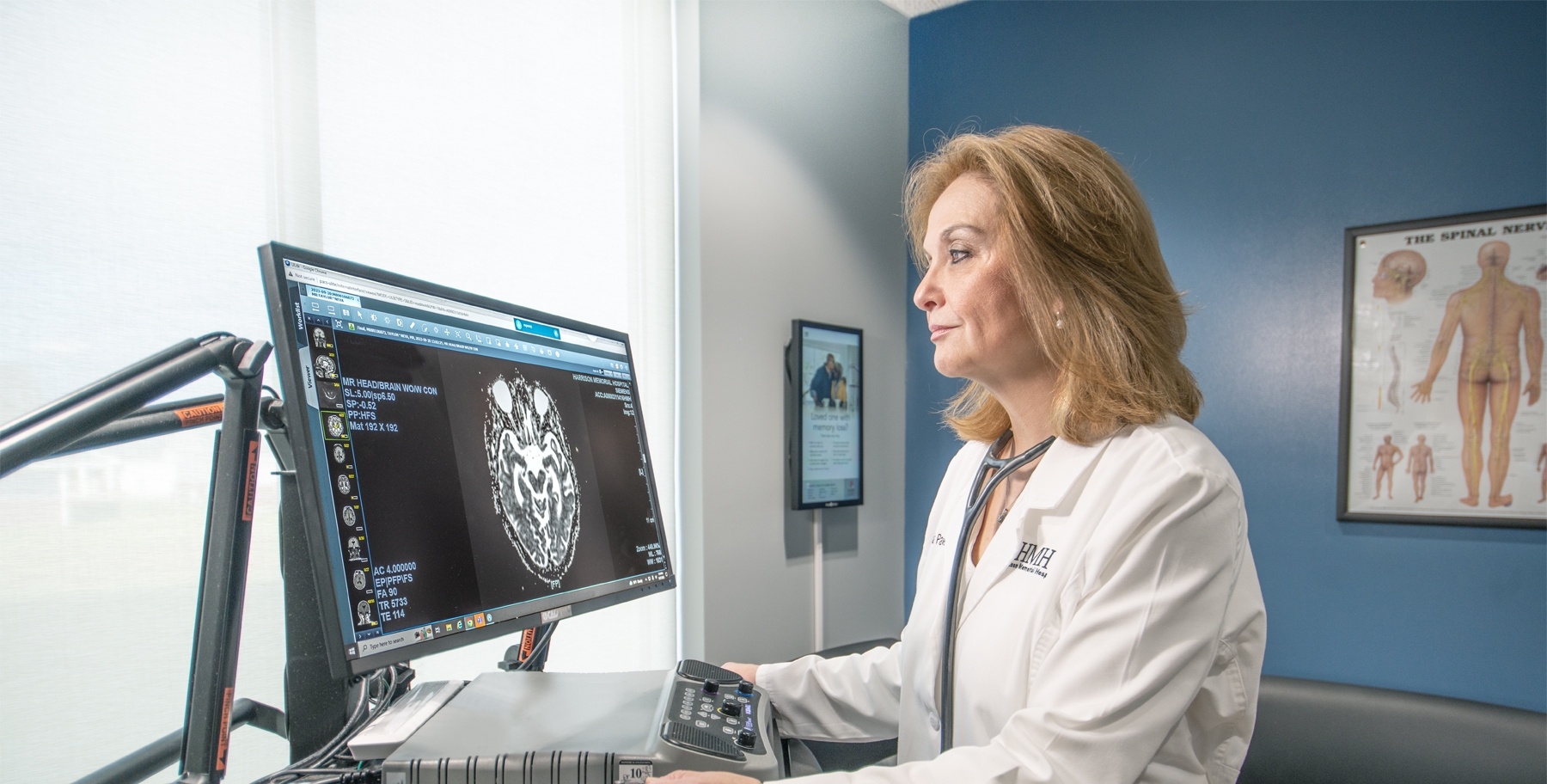 doctor looking at computer screen